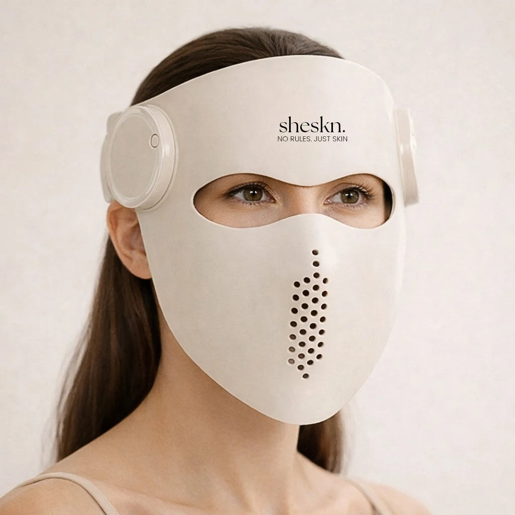 Woman wearing the Sheskn Luméskn at-home LED light therapy face mask