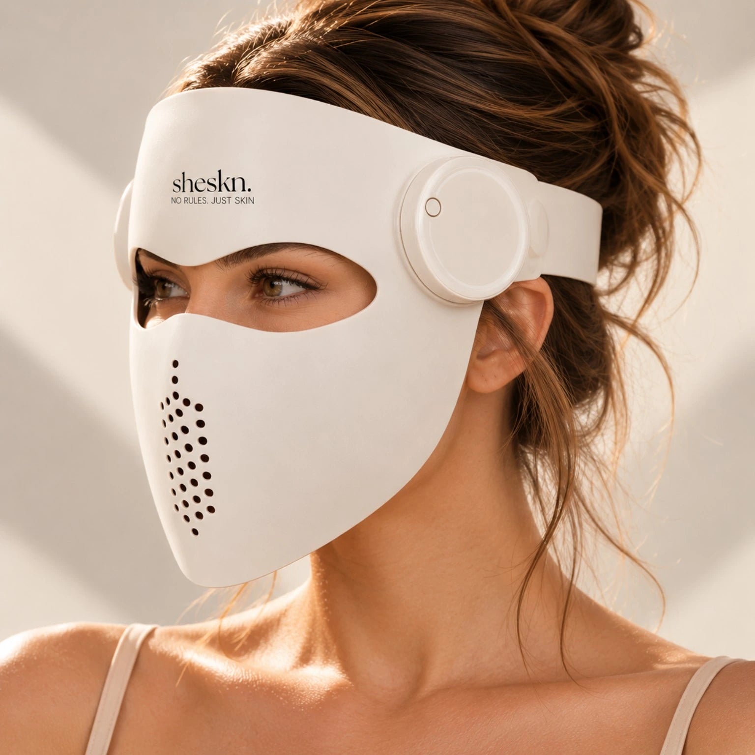 Side view of Luméskn LED face mask showing its full-face design and fit