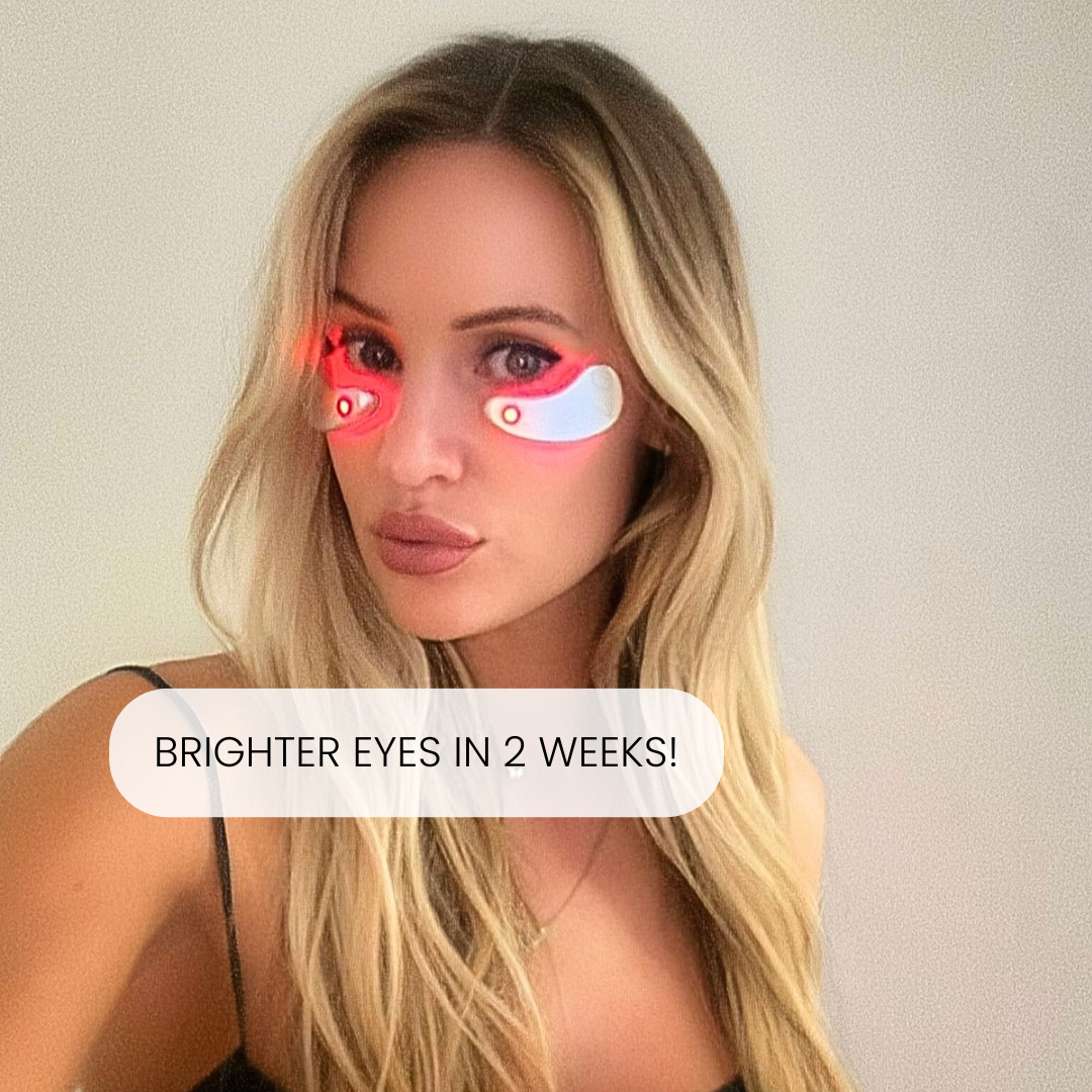 Woman using the Sheskn LED eye therapy device designed to help brighten and smooth the under eye area.