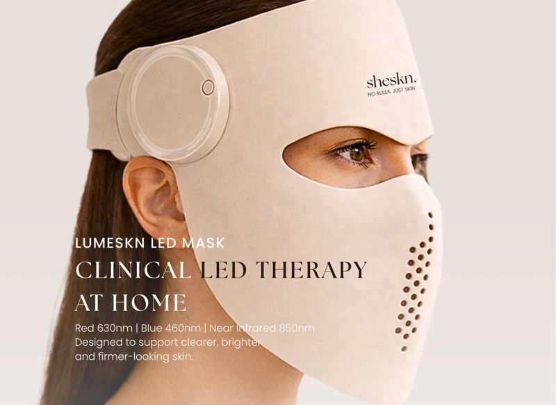 Model wearing the Sheskn Luméskn LED face mask featuring red 630nm, blue 460nm and near infrared 850nm light therapy designed to support clearer and firmer looking skin.